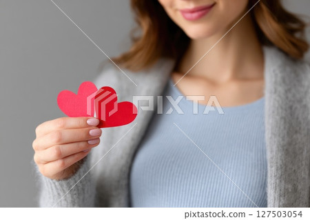 Happy Expecting Mother Holding Two Red Hearts Happy Expecting Mother Holding Two Red Hearts 127503054