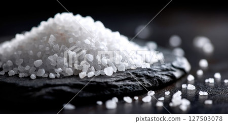 Coarse Sea Salt on Slate Surface 127503078