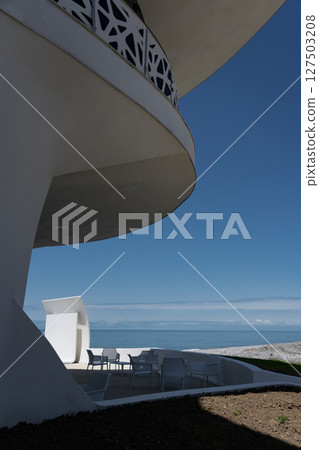 Unusual shaped buildings against the background of the black sea Batumi 127503208