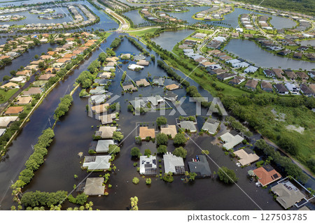 Flooded residential area with underwater houses from hurricane Debby rainfall water in Laurel Meadows community in Sarasota, Florida. Aftermath of natural disaster in southern USA Flooded residential area with underwater houses from hurricane Debby rainfall water in Laurel Meadows community in Sarasota, Florida. Aftermath of natural disaster in southern USA 127503785