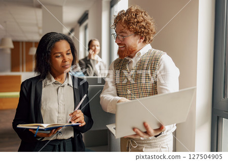 Collaborative Meeting Held in a Contemporary Office Setting, Fostering Teamwork and Ideas 127504905