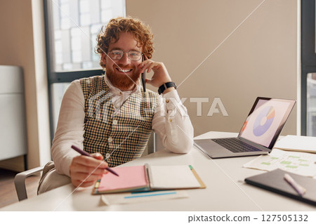 Experience a Friendly and Professional Atmosphere within a Modern Office Environment Setting 127505132