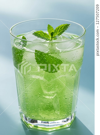 Refreshing Green Mint Drink with Ice in Glass 127507209