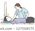 Female chiropractor giving a massage to a male patient 127508575