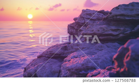 Sunset violet sky on horizon line in ocean rock edge 127508788