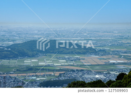 The townscape and rural scenery of Koda Town seen from Toboneyama (wheat harvest season) 127509903