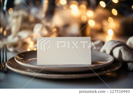 Minimalist wedding place card on an elegant table setting 127510493