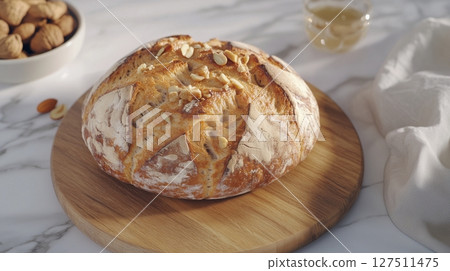 Gluten free bread sourdough with almond and peanut on wooden board 127511475