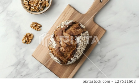 Gluten free bread sourdough with buckwheat and walnut on wooden board 127511608