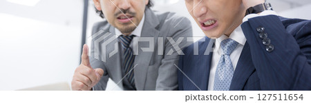 A faceless banner depicting a boss scolding a subordinate and a subordinate being scolded for not achieving goals or making mistakes - How far does power harassment go? 127511654