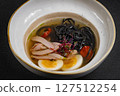 chicken noodle soup. curry soup close-up Japanese food Chinese dish. chicken soup with turkey and black spaghetti. 127512254