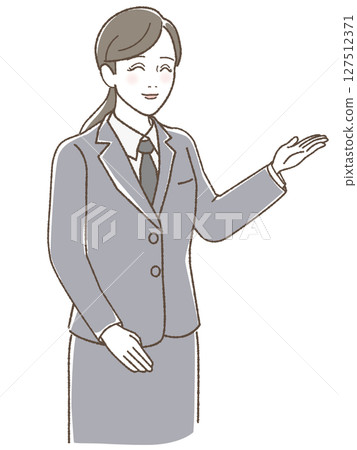 A woman in a suit smiling and raising her hand 127512371