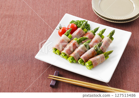 Bacon wrapped asparagus served on a plate Bacon wrapped asparagus served on a plate 127513486