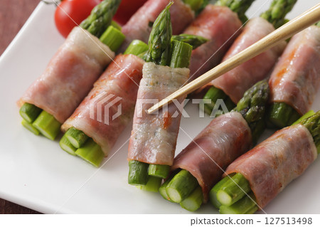 Bacon wrapped asparagus served on a plate Bacon wrapped asparagus served on a plate 127513498