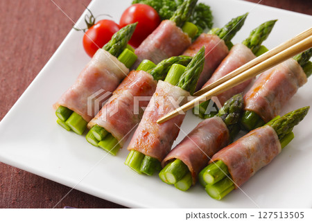 Bacon wrapped asparagus served on a plate Bacon wrapped asparagus served on a plate 127513505