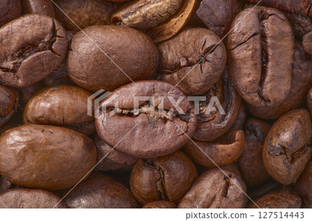 Macro Close-Up of Roasted Coffee Beans Texture 127514443