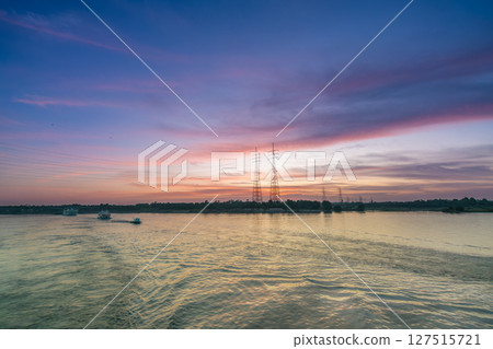 Power Lines Over Nile River at Sunset Near Esna Lock Egypt Power Lines Over Nile River at Sunset Near Esna Lock Egypt 127515721