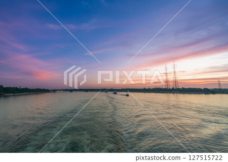 Power Lines Over Nile River at Sunset Near Esna Lock Egypt Power Lines Over Nile River at Sunset Near Esna Lock Egypt 127515722