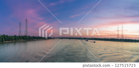 Power Lines Over Nile River at Sunset Near Esna Lock Egypt 127515723