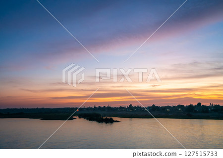 Serene Nile River Sunset Esna Lock Aswan Egypt Landscape. Serene Nile River Sunset Esna Lock Aswan Egypt Landscape. 127515733