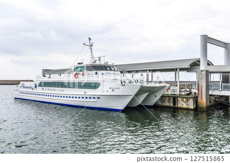 The high-speed ferry Phoenix moored at the passenger terminal pier 127515865