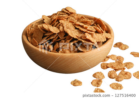 Close-up of crispy cereal flakes in a bowl, isolated on white 127516400