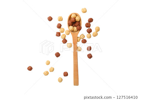 Artful cereal balls by a spoon, isolated on white Artful cereal balls by a spoon, isolated on white 127516410
