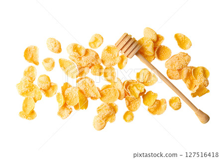 Corn flakes with honey dipper, isolated on white 127516418