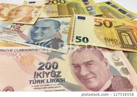 Turkish Lira and Euro banknotes side by side, representing currency exchange, finance, and global economy. 127516558