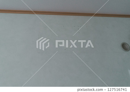 Remains of the wall air conditioner removed Remains of the wall air conditioner removed 127516741