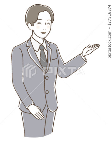 A man in a suit giving directions with a smile and raising his hand 127516874