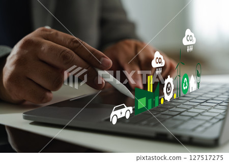Business sustainability image shows person using stylus digital tablet with various eco friendly and technology icons floating above Business sustainability image shows person using stylus digital tablet with various eco friendly and technology icons floating above 127517275
