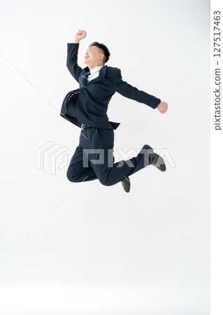 Young male business jump Young male business jump 127517463