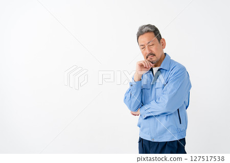 Men in work clothes worried Men in work clothes worried 127517538