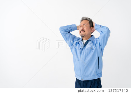 Men in work clothes worried Men in work clothes worried 127517540
