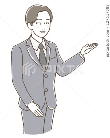 一位面帶微笑的中年男子舉手為人們指引方向 127517588