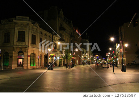 Beautiful illumination of night Lodz city. illuminated street in Lodz Beautiful illumination of night Lodz city. illuminated street in Lodz 127518597