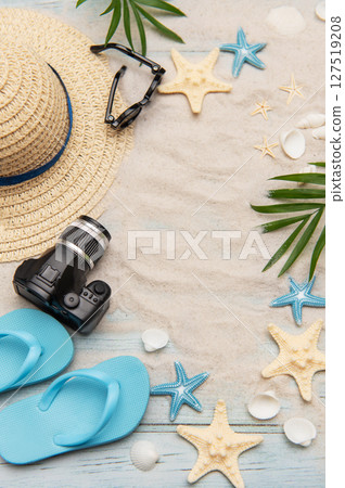 Summer beach vacation background with accessories creating relaxing mood 127519208