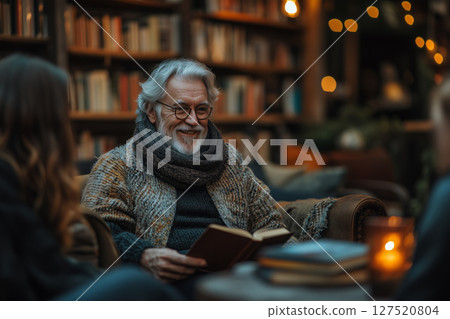 a book club meeting with people aged 50, sitting in a cozy living room, discussing a book 127520804