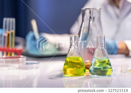 Colorful Chemical Solutions in Laboratory Glassware Colorful Chemical Solutions in Laboratory Glassware 127521519