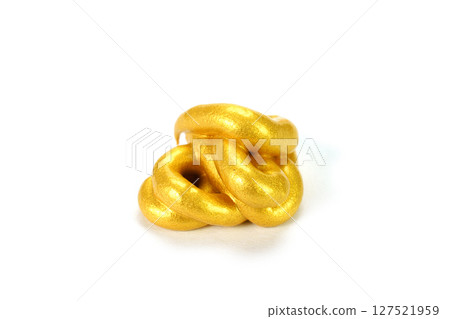 Gold paint squeezed out of a tube Gold paint squeezed out of a tube 127521959