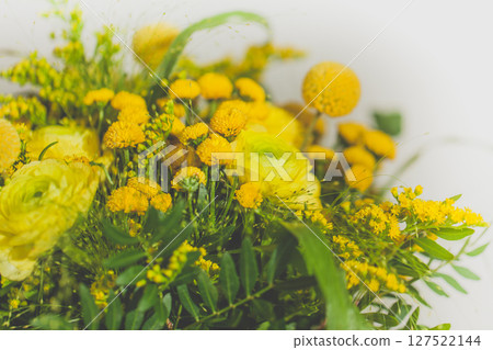 Summer flowers, green and yellow background 127522144