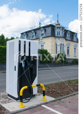 Fuel, oil, tank, gas filling - electric station. Car sharing commuter charging station. 127523258