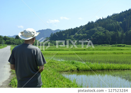 Spraying pesticides with agricultural drones Spraying pesticides with agricultural drones 127523284