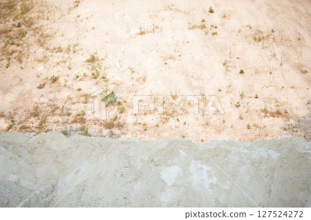 Mountain texture with white sand and vegetation. Waste from old chemical production. Mountain texture with white sand and vegetation. Waste from old chemical production. 127524272