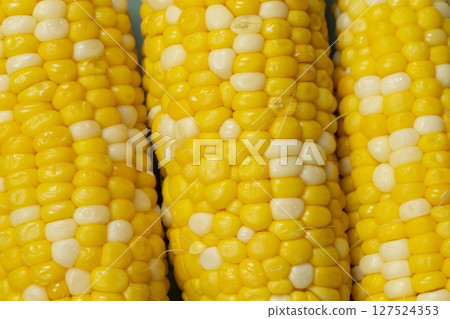 Yellow cooked corn close-up. 127524353
