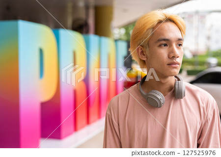 Prdie portrait of confident young teenage gay man 127525976