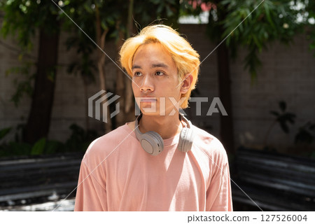 Man with septum piercing nose ring thinking 127526004