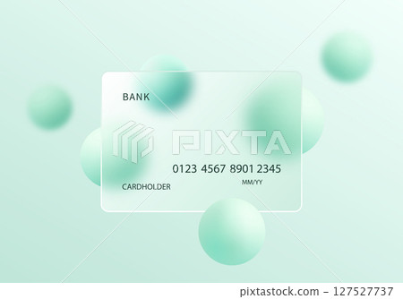 Glass morphism style banking card with floating green spheres 127527737