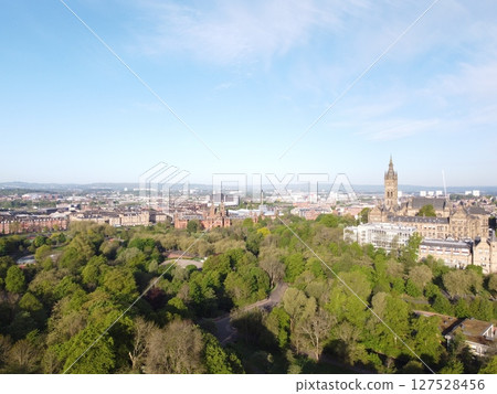 Glasgow is Scotland largest city in the UK, featuring historic, artistic charm with beautiful Victorian architecture and the Clyde River. 127528456